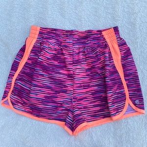C9 Girls athletic shorts in vibrant orange and purple combination. L/10-12